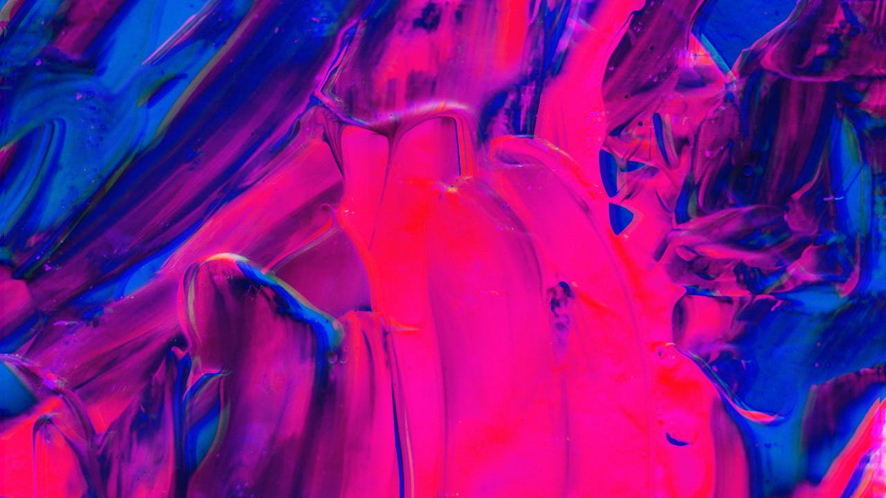 Swirling colorful abstract painting in pink and blue tones