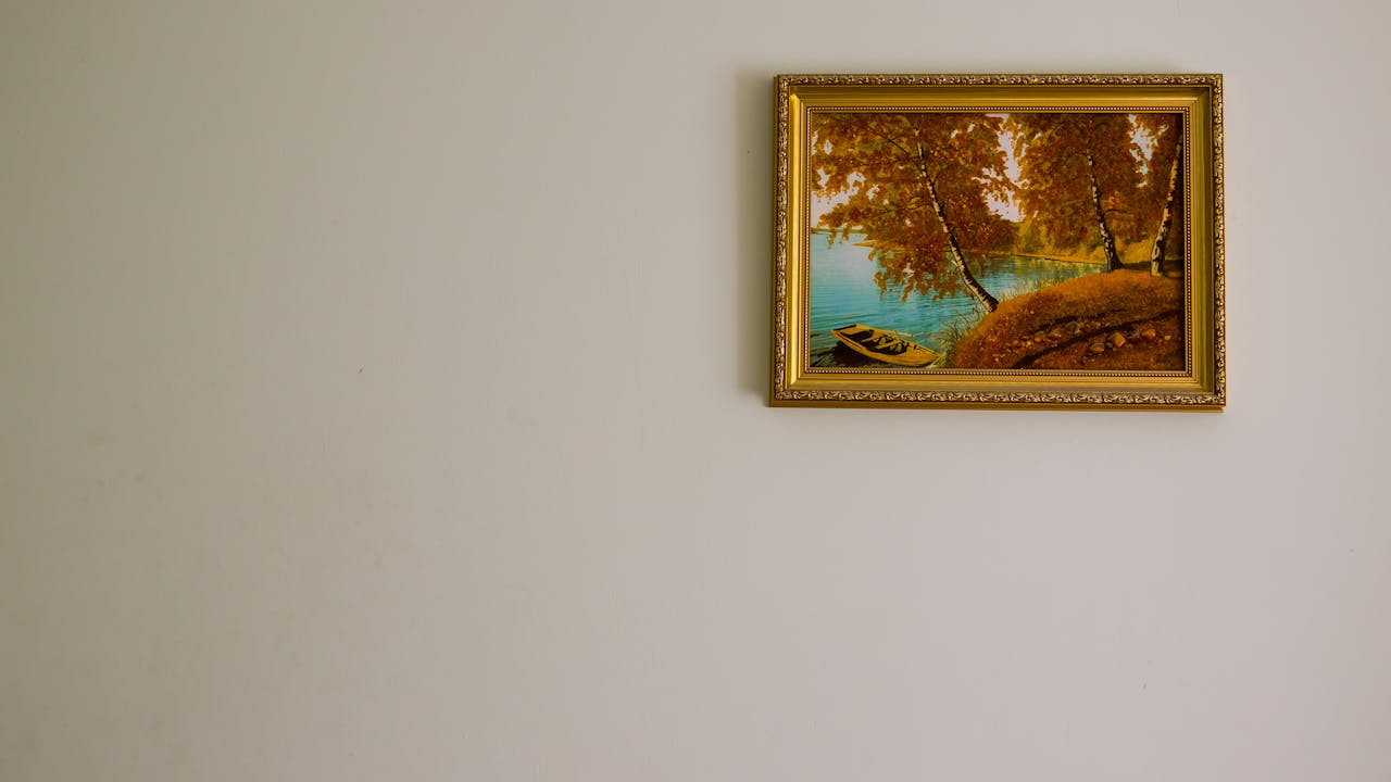 Framed artwork displayed on a wall in a home