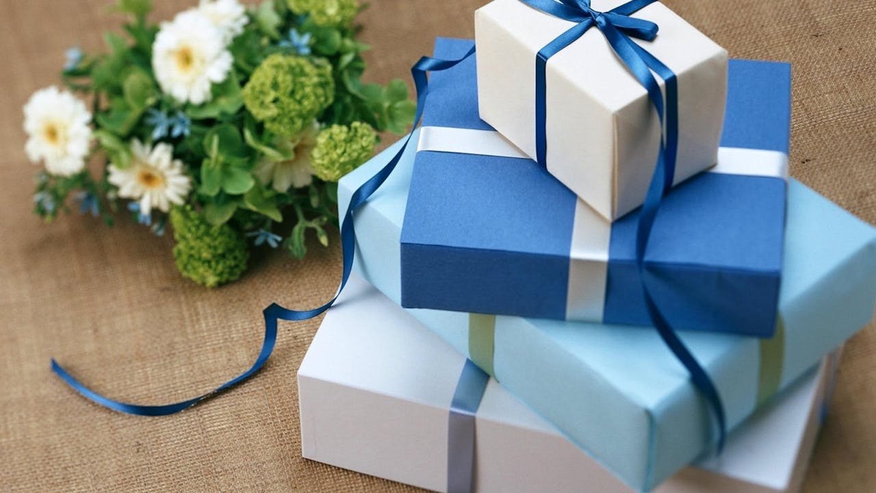 Beautifully arranged gift basket with gourmet items and personalized gifts for dad