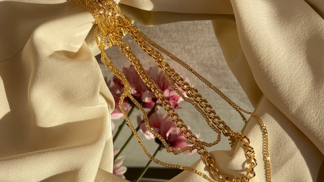 Beautifully wrapped baby gifts with ribbon and spring flowers