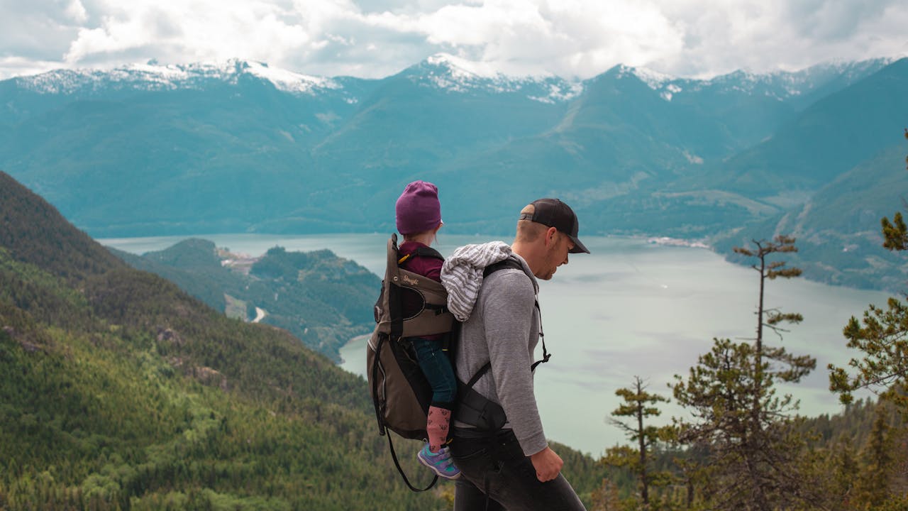 Family hiking together on a scenic trail through nature