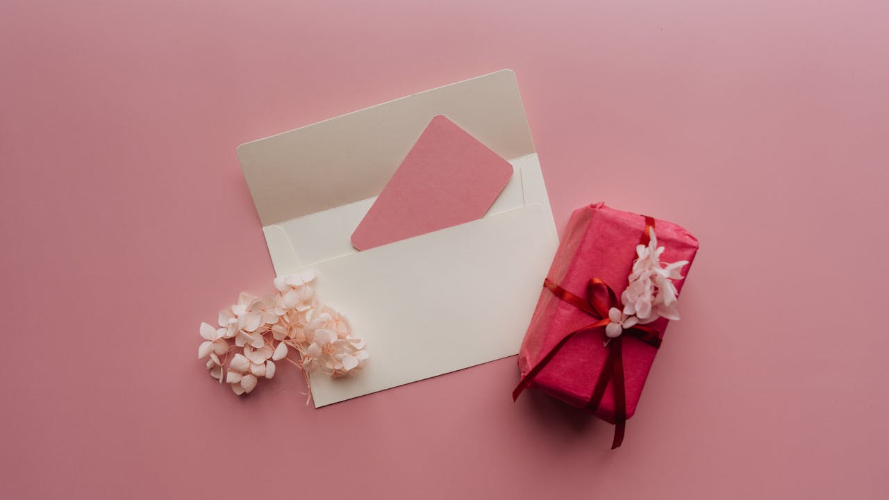 Opening a thoughtful Valentine's Day gift envelope