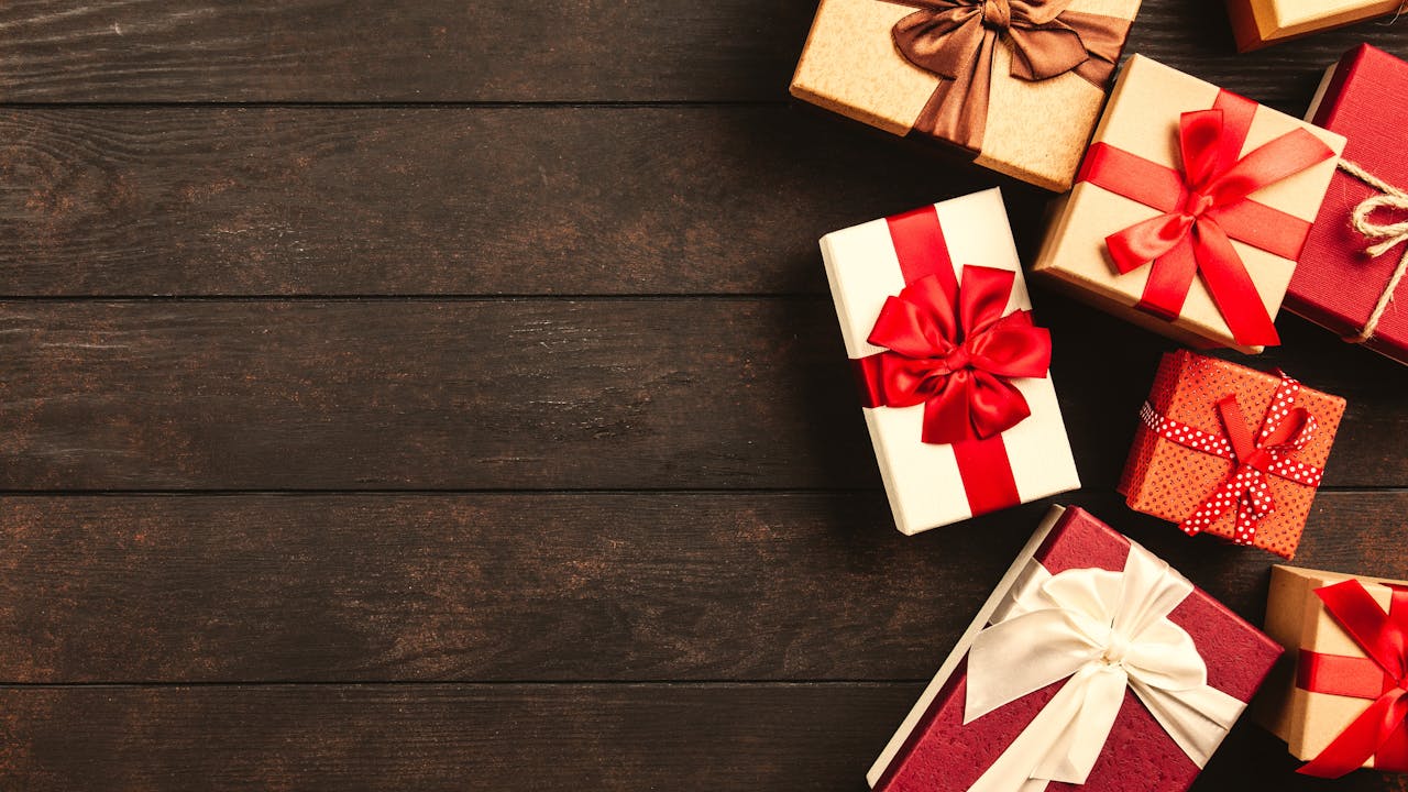 Beautifully wrapped gift with ribbon and decorations