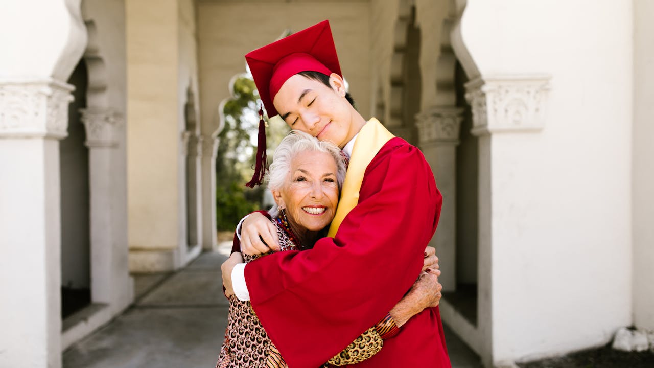 A family celebrating their graduate's achievement