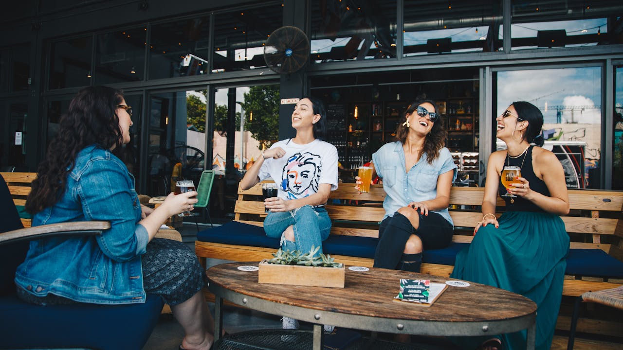 Young adults celebrating at an outdoor gathering