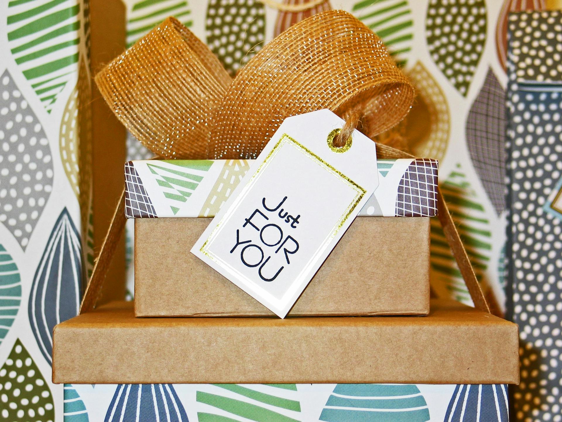 Beautifully wrapped gift boxes with ribbons and bows, perfect for mother-in-law gift ideas