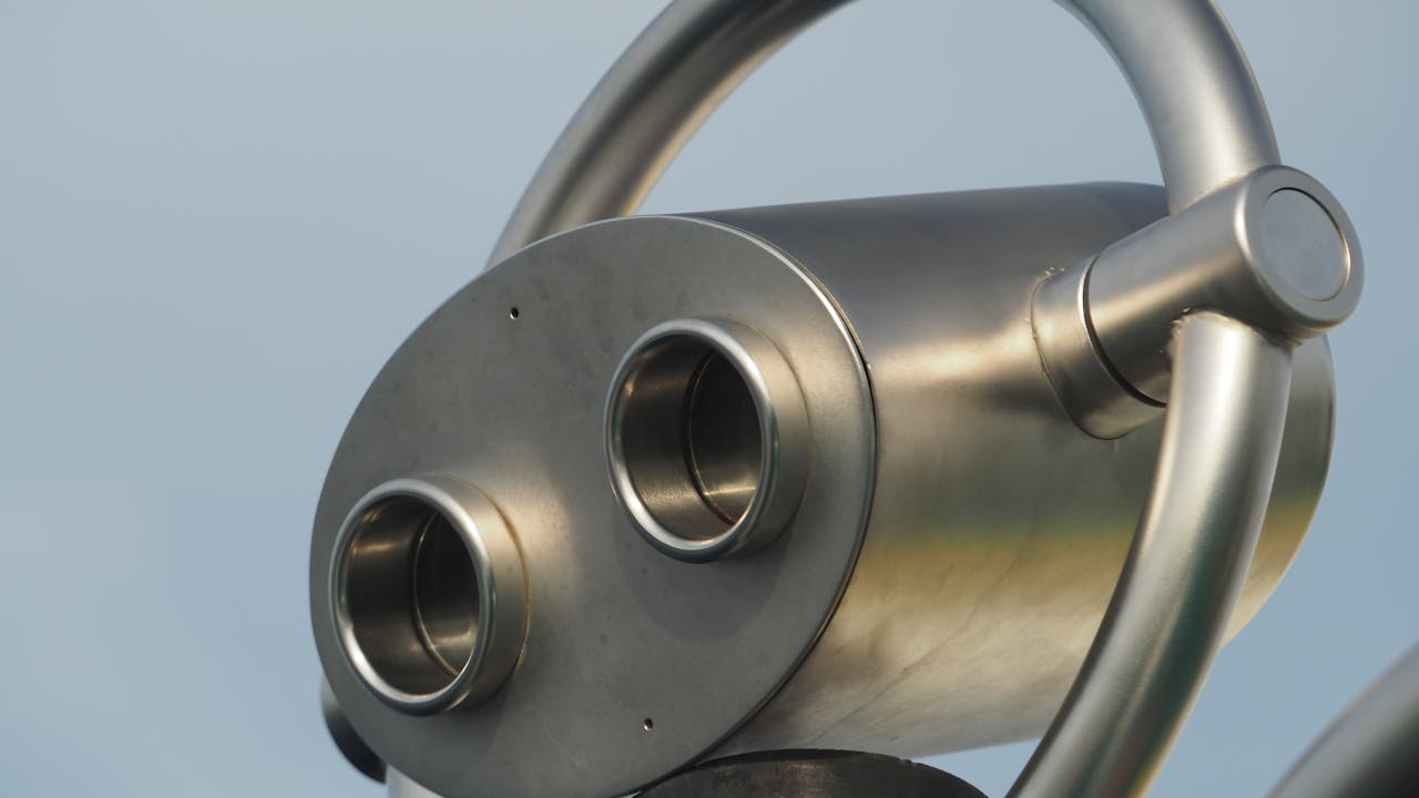 Hunting binoculars and optics equipment on a log