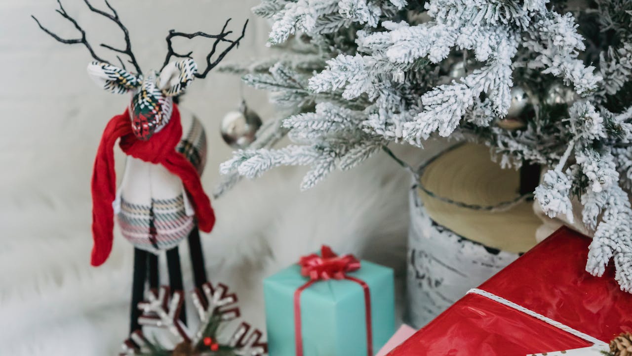 Beautifully wrapped Christmas gifts under a tree