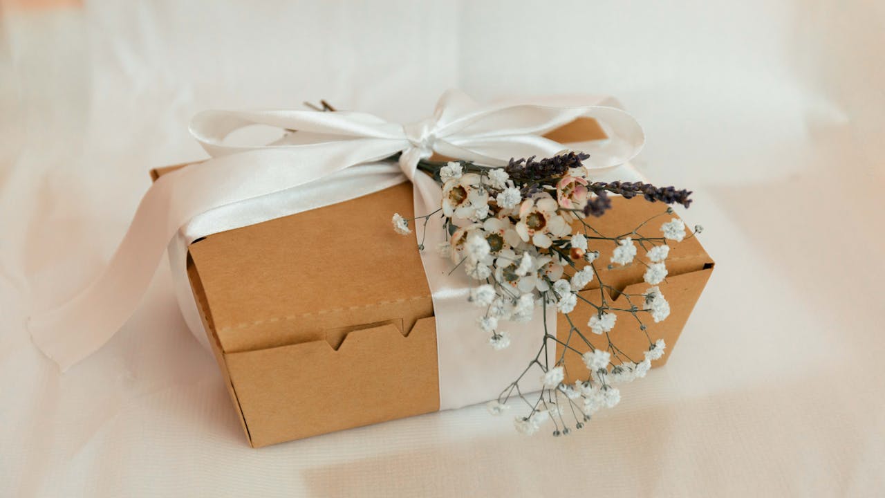 Beautifully wrapped gift with artistic paper and ribbon