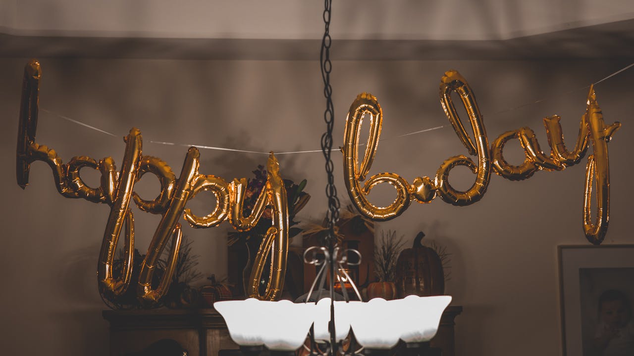 Birthday celebration with gifts and warm lighting