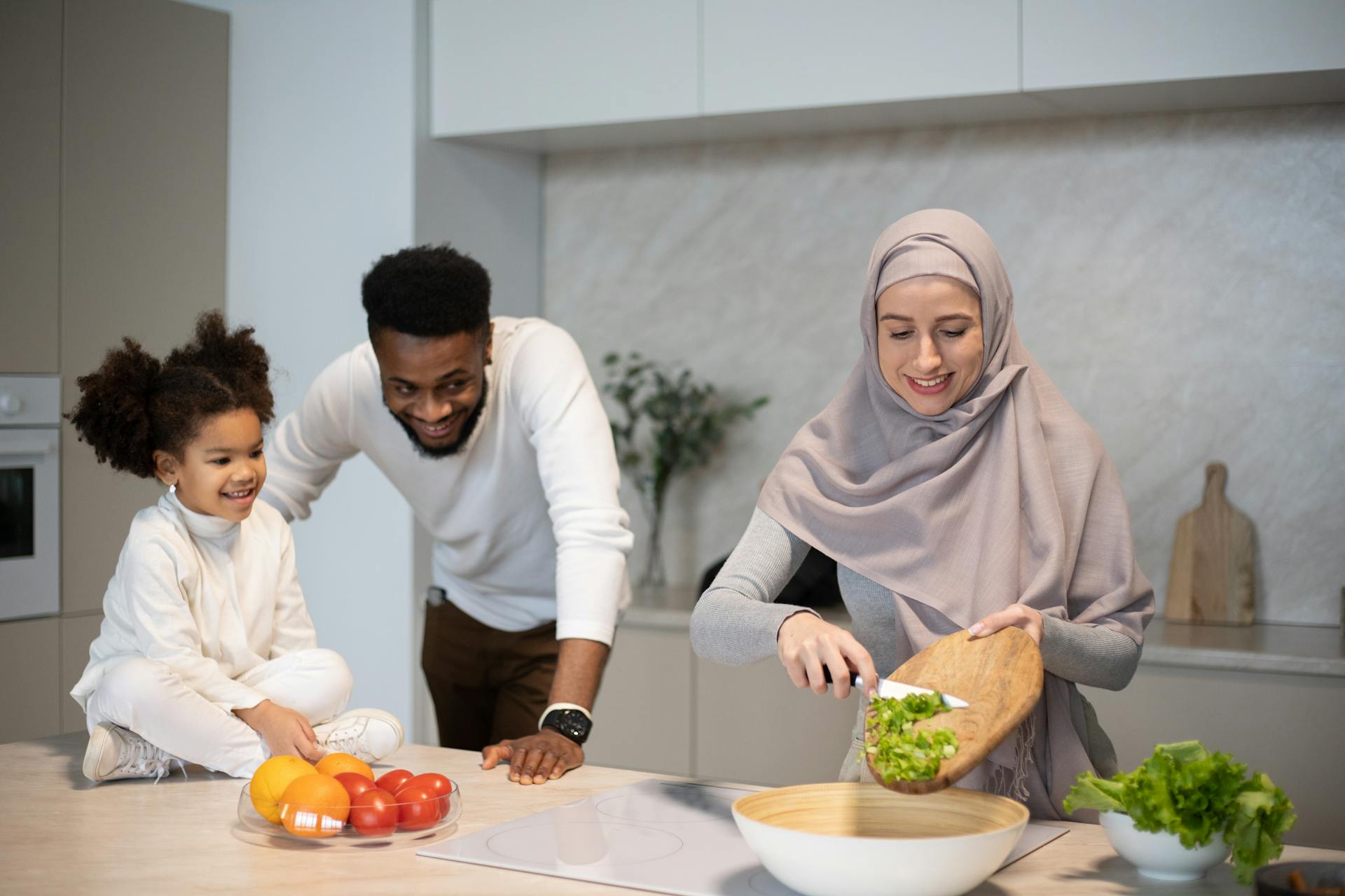 Family cooking together in the kitchen