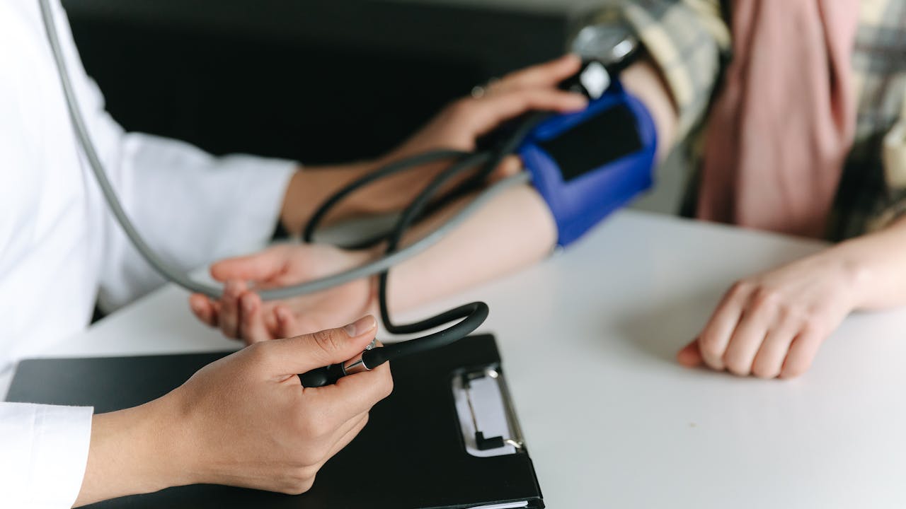 Physical therapist helping patient during rehabilitation session