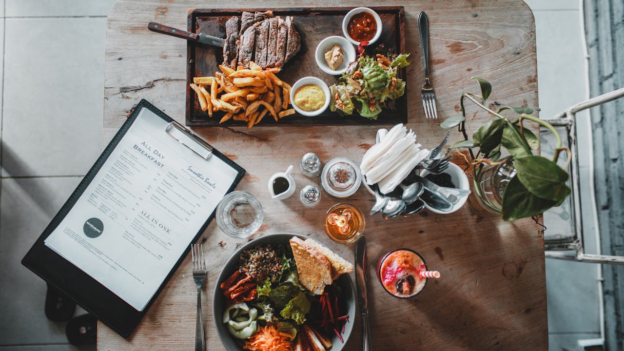 Artisan gluten-free bread and baked goods on rustic wooden surface