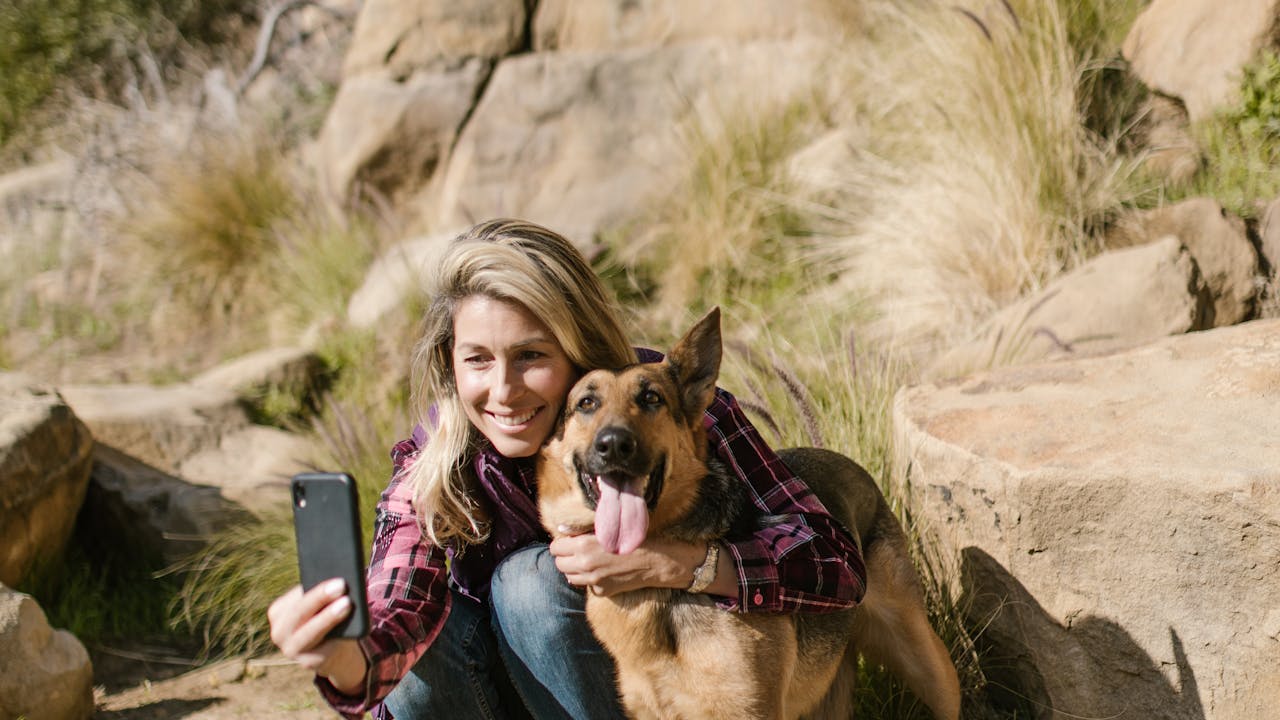 Person photographing their pet in good lighting
