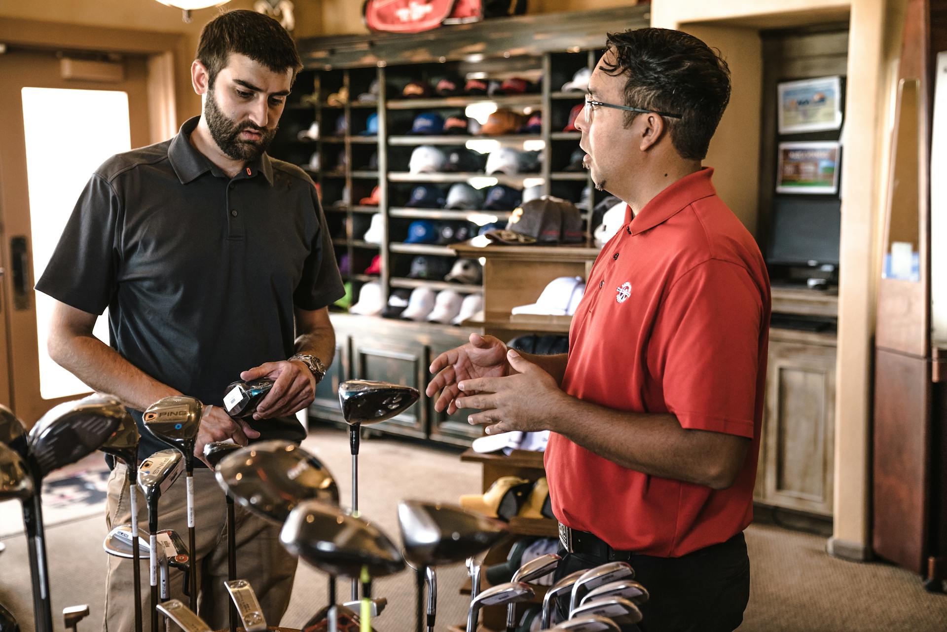 Golf clubs and bag on course