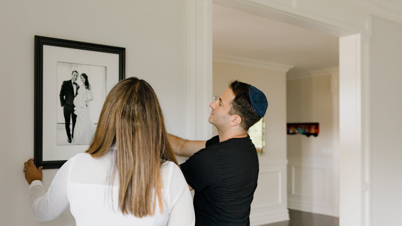 Framed portrait hanging on the wall, displayed as meaningful home decor
