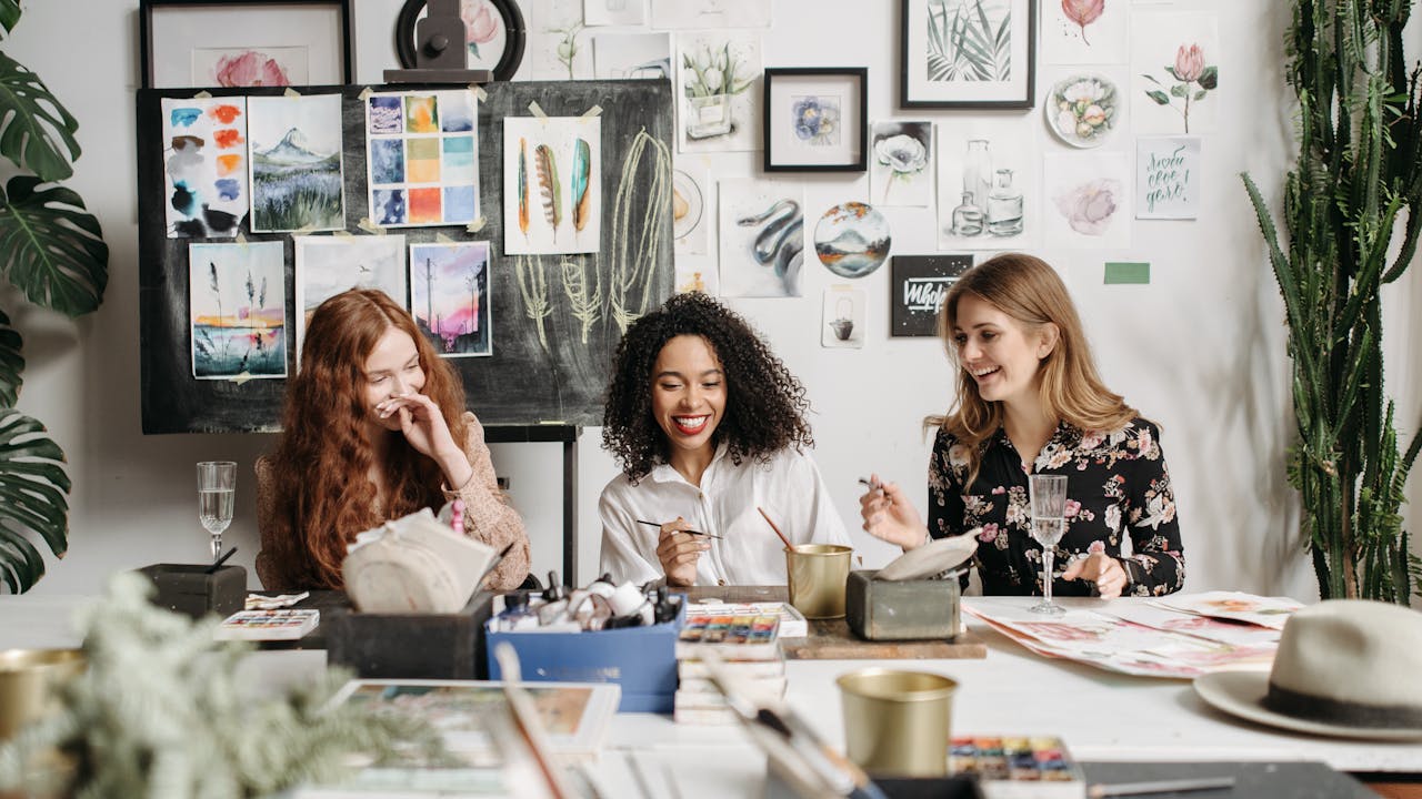People painting together at an art workshop