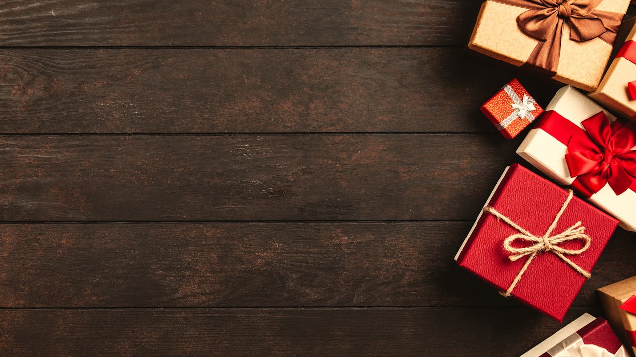Christmas gifts under the tree with warm holiday lighting